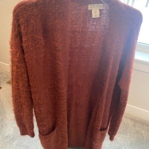 Like new super soft, long rust color cardigan!